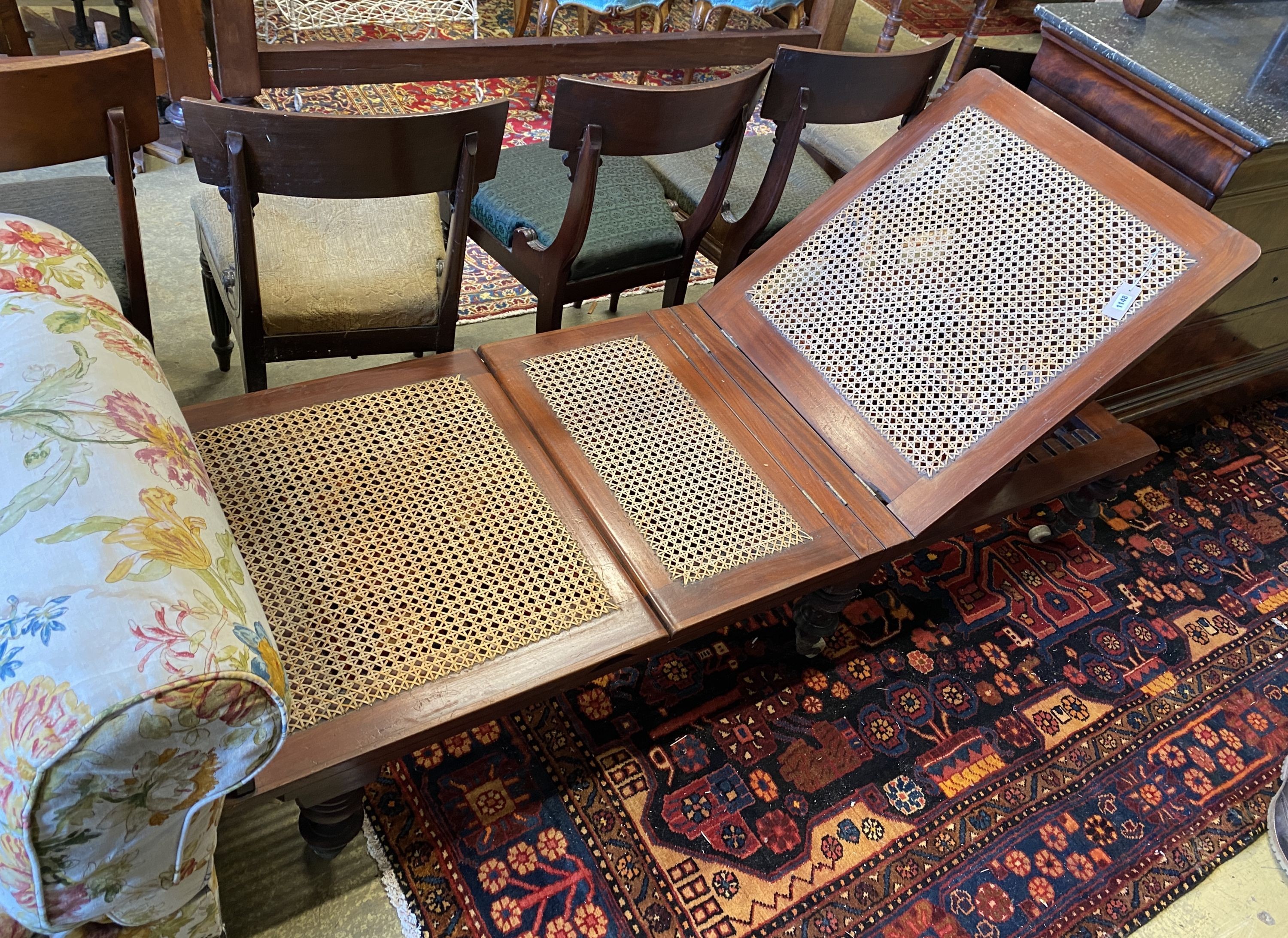 A Victorian caned mahogany folding campaign day bed, length 186cm, width 71cm